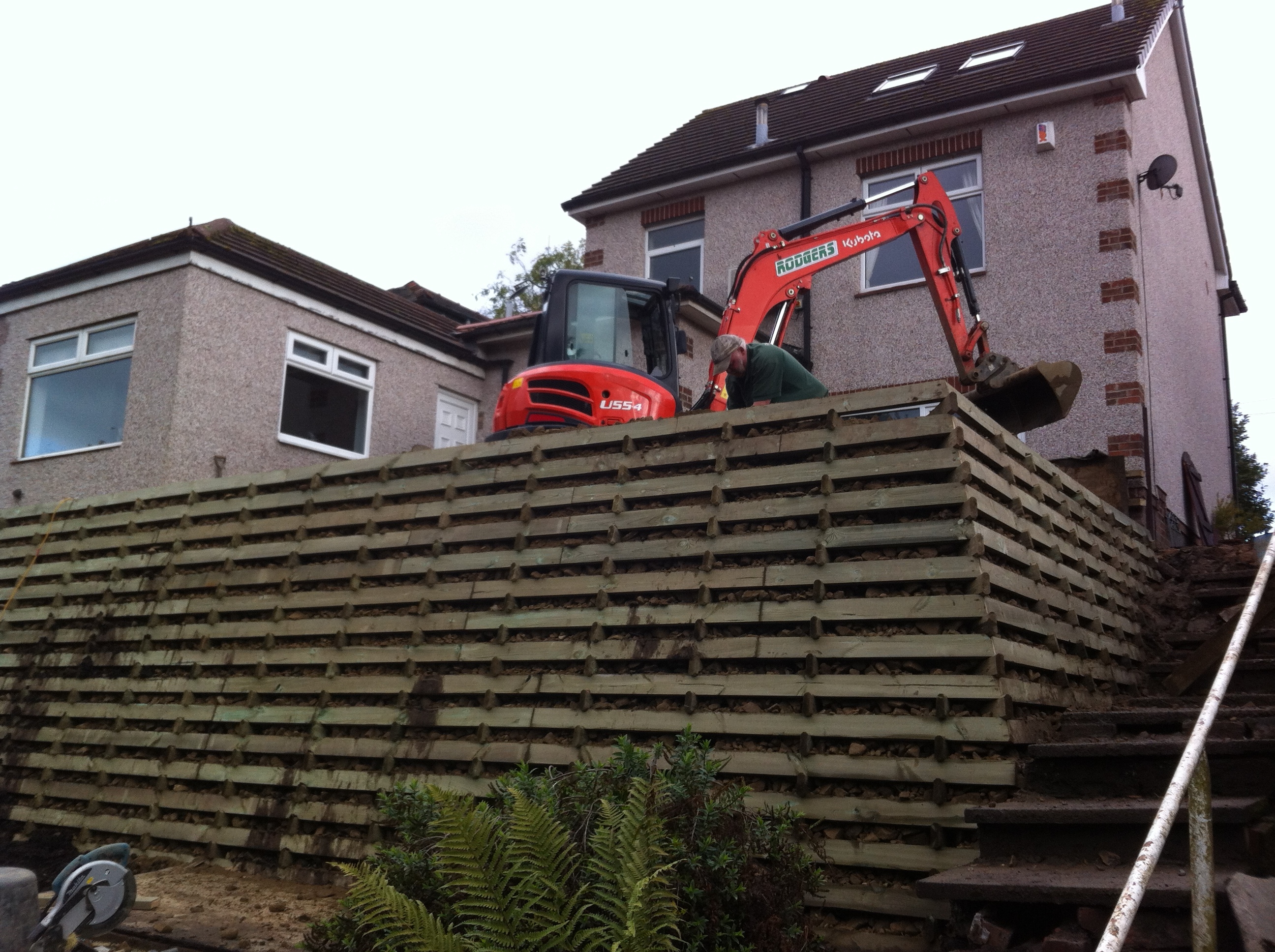 Timbalok timber crib retaining wall installed by Country Landscapes Ltd
