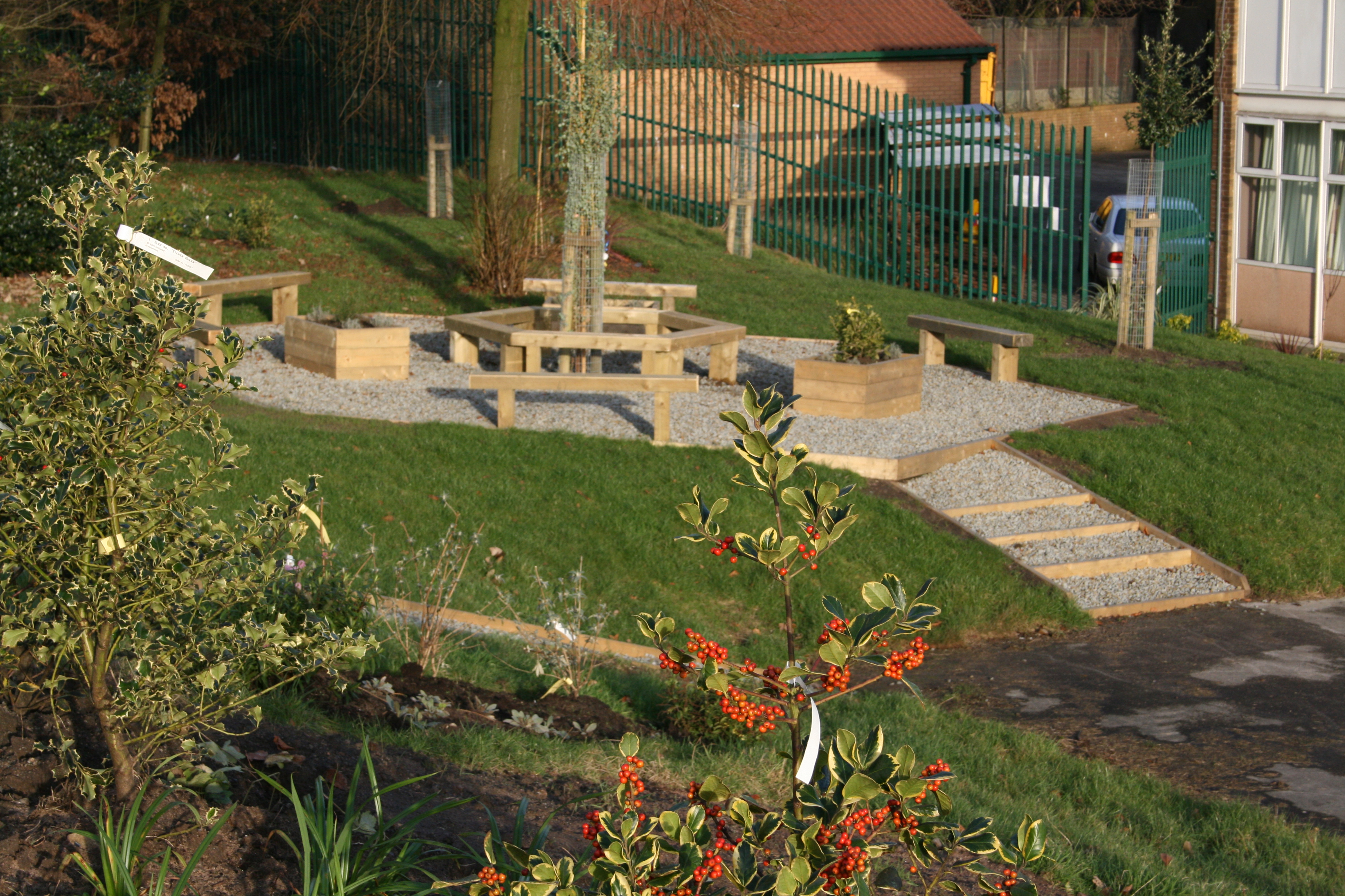 Tree planting and seating at Mathew Moss High School Eco-Garden