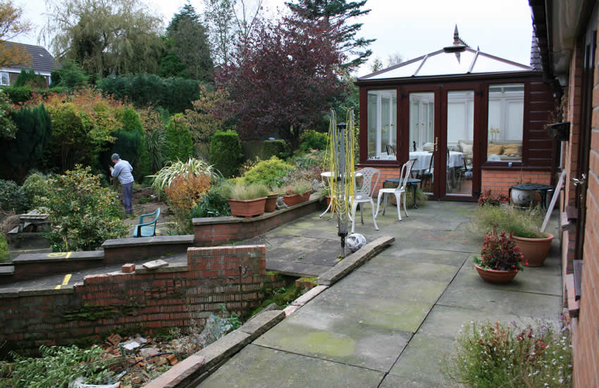 old paved patio before transformation